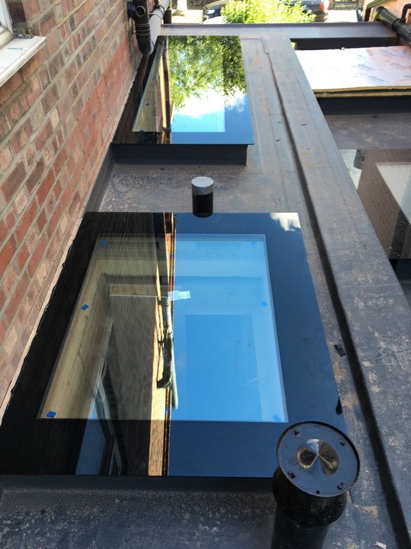 Multiple flat roof skylights on extension in Didcot